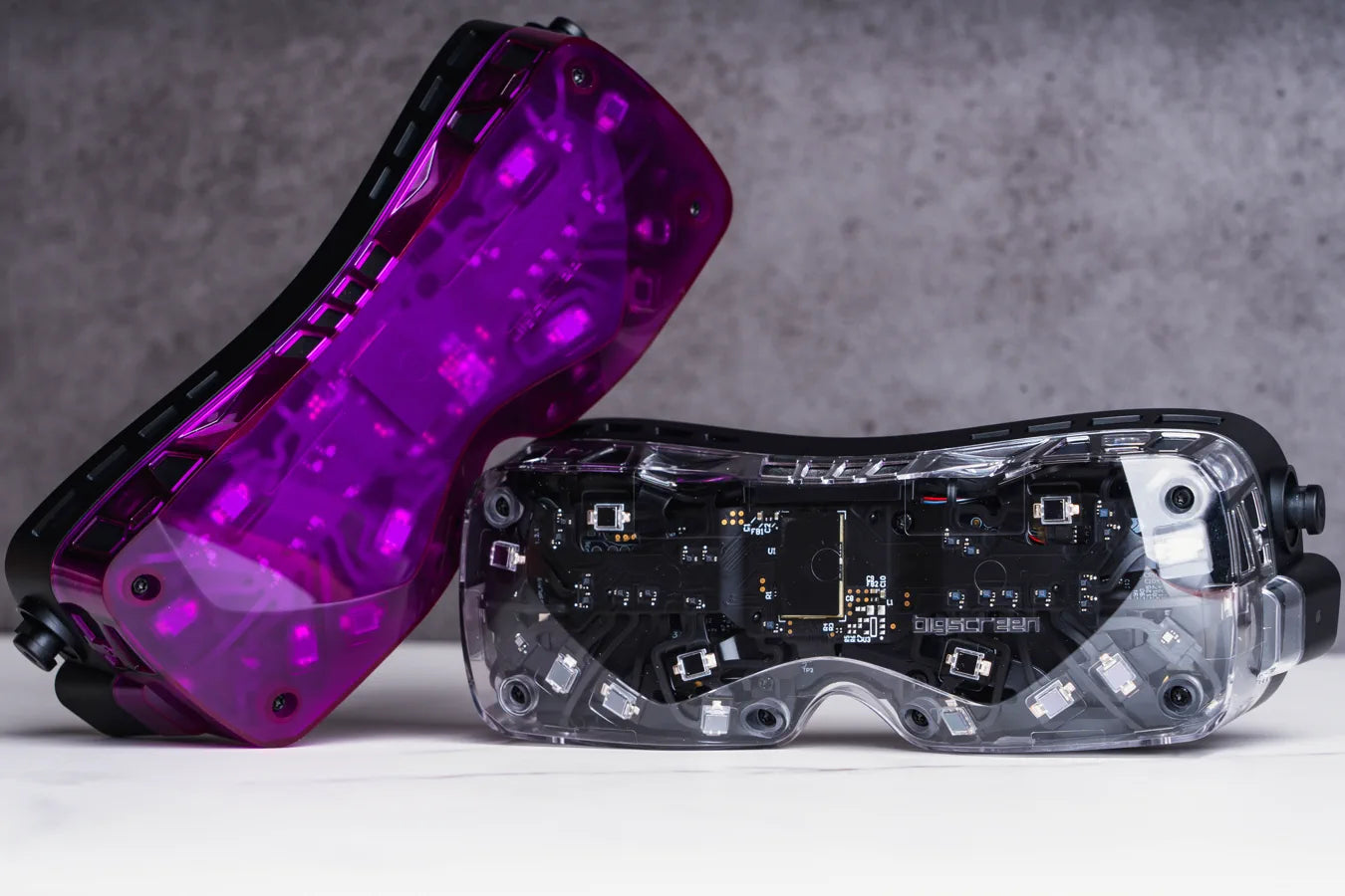 A purple and a clear Beyond 2 photographed side by side