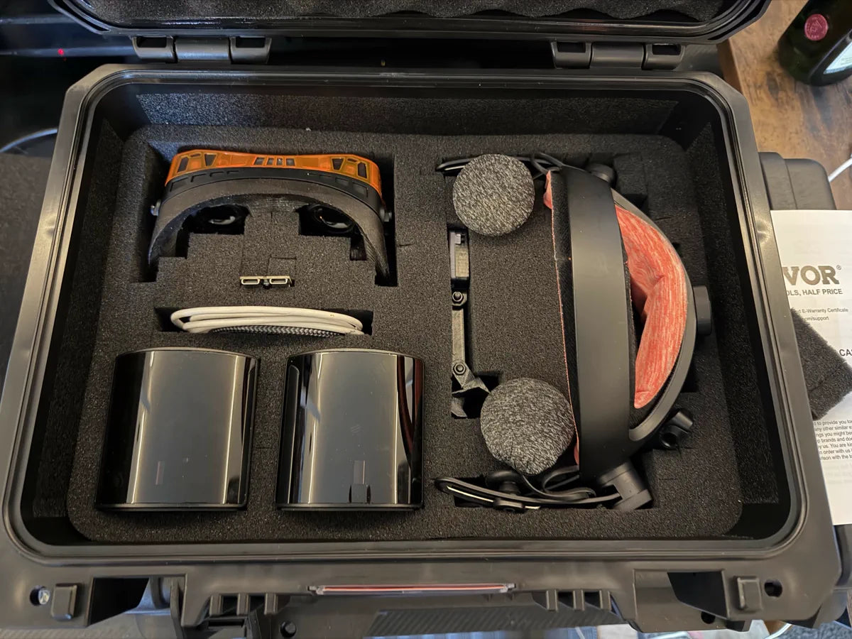 A Beyond 2 and its accessories packed into a foam-lined hard case