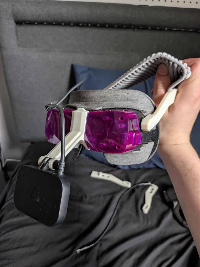 A purple Beyond 2 with a white strap held in both hands
